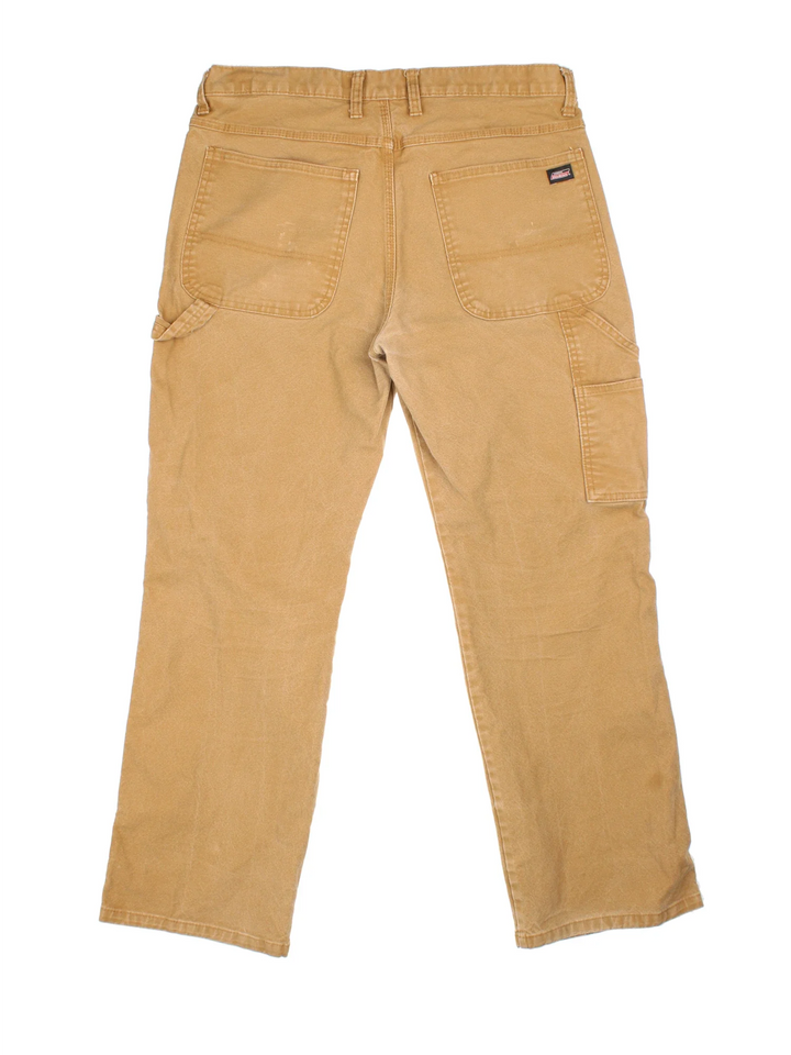 Dickies Carpenter Jeans in tan colourway with multiple pockets and the logo embroidered on the back.