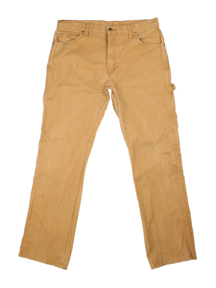 Dickies Carpenter Jeans in tan colourway with multiple pockets and the logo embroidered on the back.