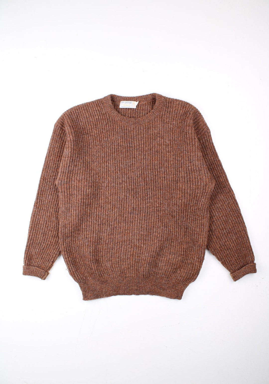 Vintage James Pringle jumper in a brown colourway. Ribbed with elasticated collar, hem and cuffs.