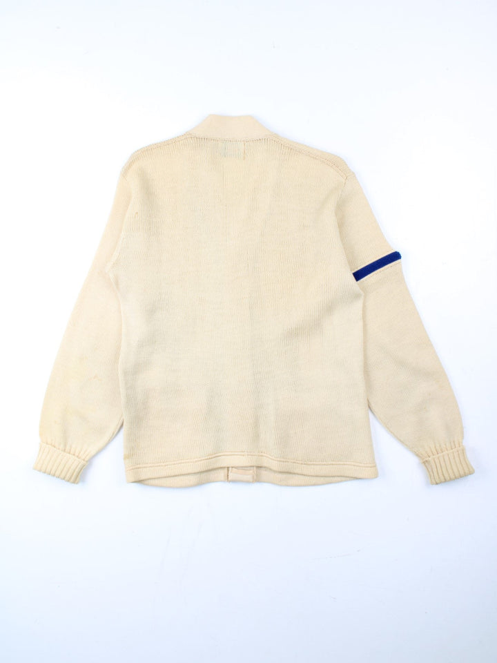 Vintage Letterman Cardigan in a white/blue colourway. V neck, button down fastening with embroidered logo on front.