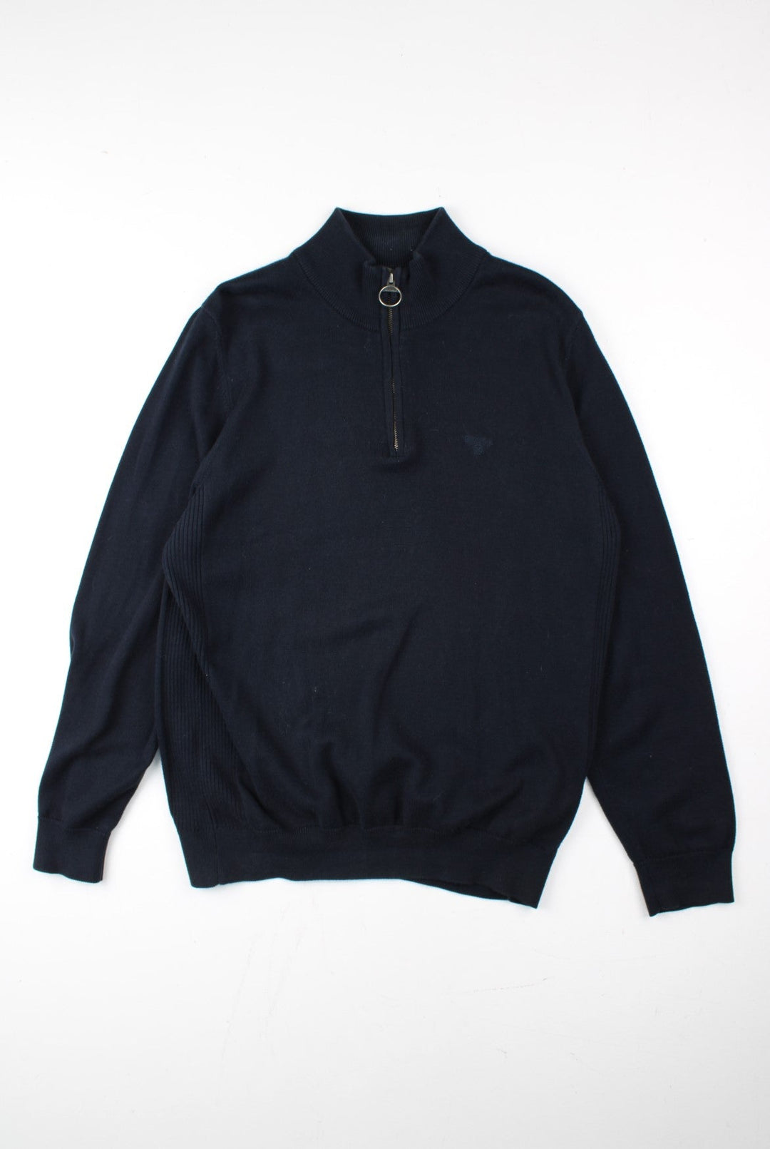 Barbour 1/4 Zip Jumper in a blue colourway. 1/4 zip fastening, ribbed side detail and embroidered logo on front.