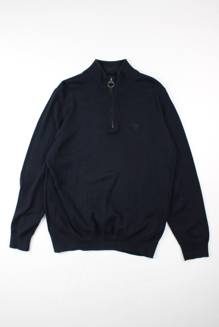 Barbour 1/4 Zip Jumper in a blue colourway. 1/4 zip fastening, ribbed side detail and embroidered logo on front.