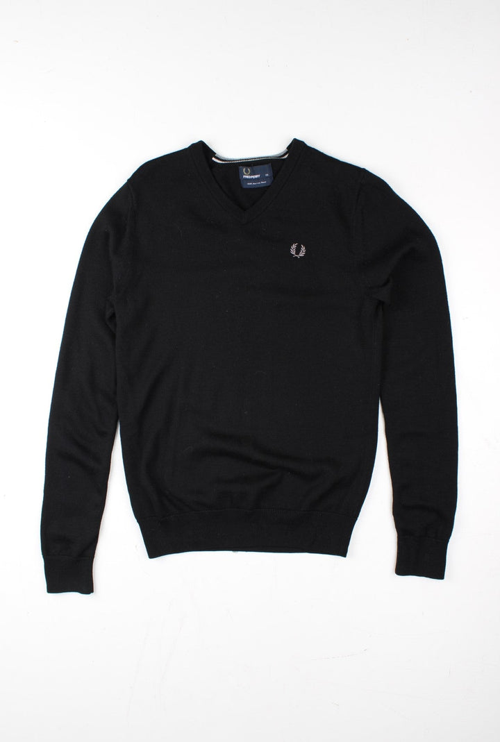 Fred Perry Jumper in a black colourway. V neck, with embroidered logo on front.