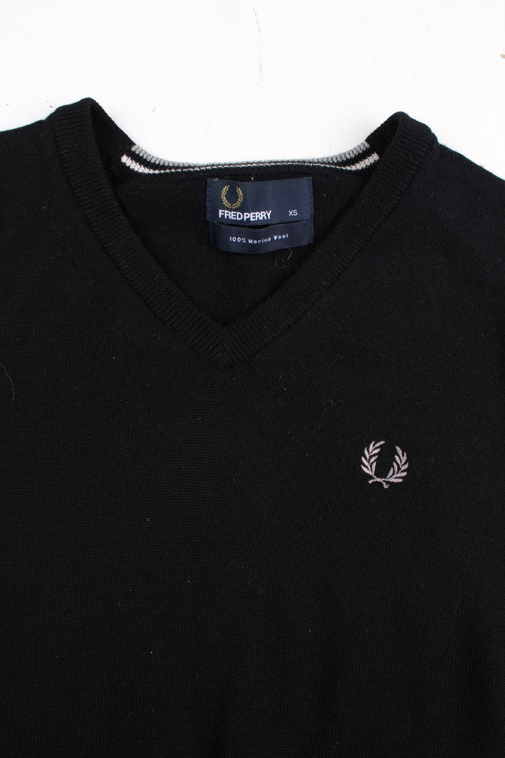 Fred Perry Jumper in a black colourway. V neck, with embroidered logo on front.