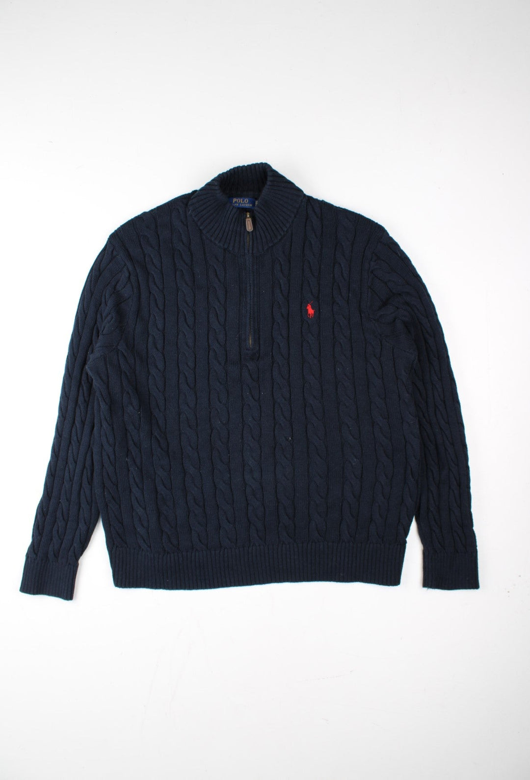 Ralph Lauren 1/4 Zip Jumper in a blue colourway. 1/4 zip, with embroidered logo on front.