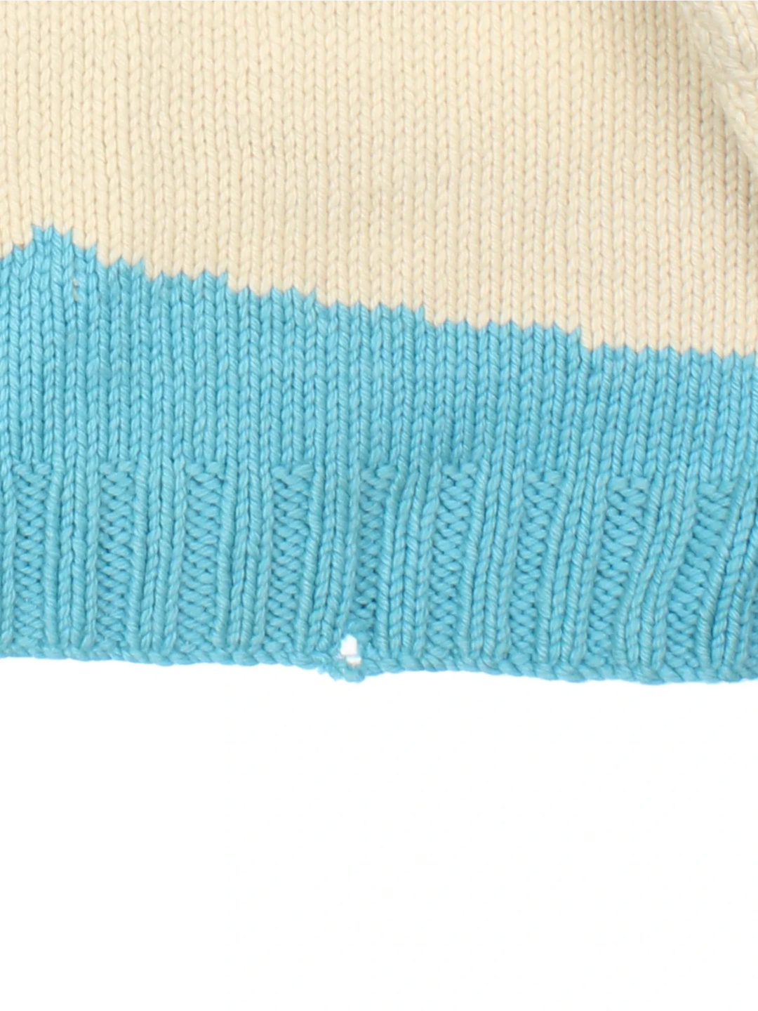 Vintage 80's Snowflake Cowichan Knitted Sweater in a tan and blue colourway with snowflake patterns all over, zip up closure and has double front pockets.
