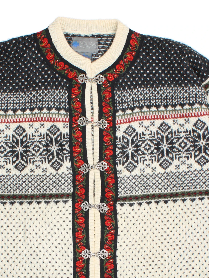Vintage Norwegian Cardigan in a tan colourway with clasp closure and patterns all over.