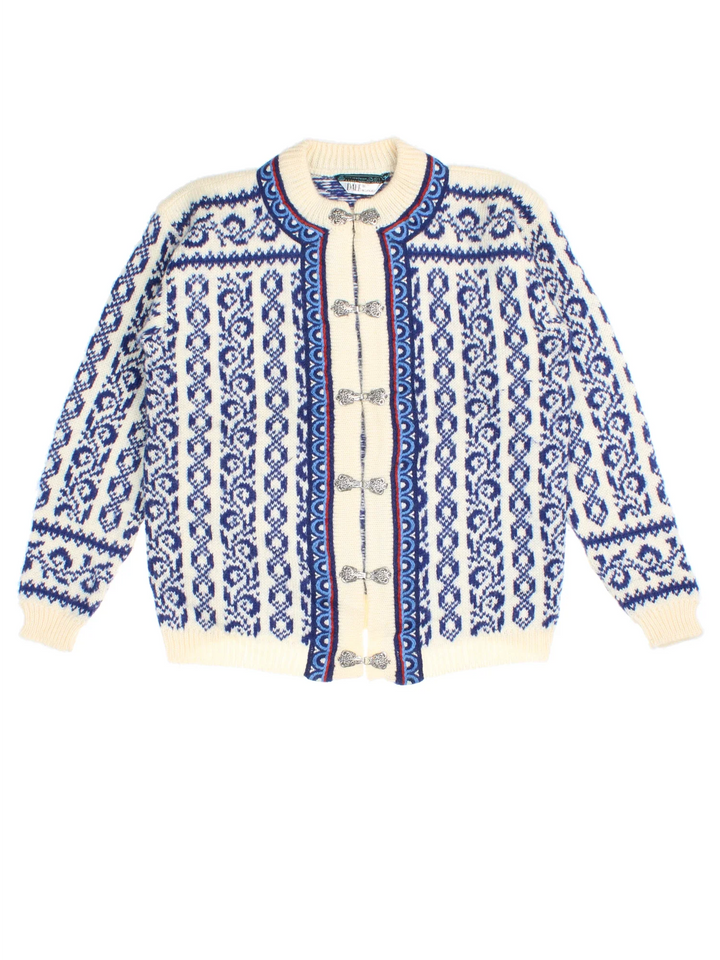 Vintage Dale Of Norway Cardigan in a tan and blue colourway with clasp closure and patterns all over.