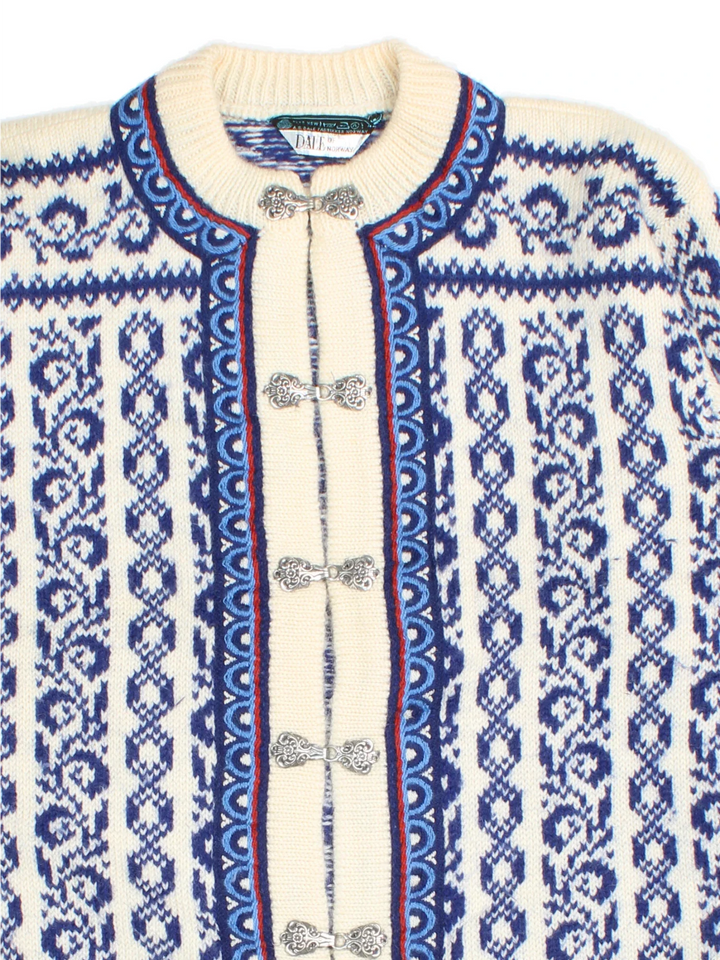 Vintage Dale Of Norway Cardigan in a tan and blue colourway with clasp closure and patterns all over.