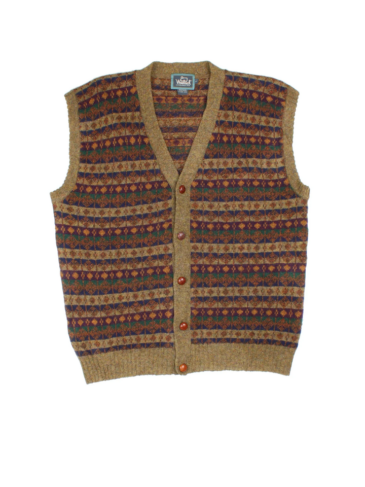 Woolrich Knitted Waistcoat in a brown colourway with all over patterns and button up closure.