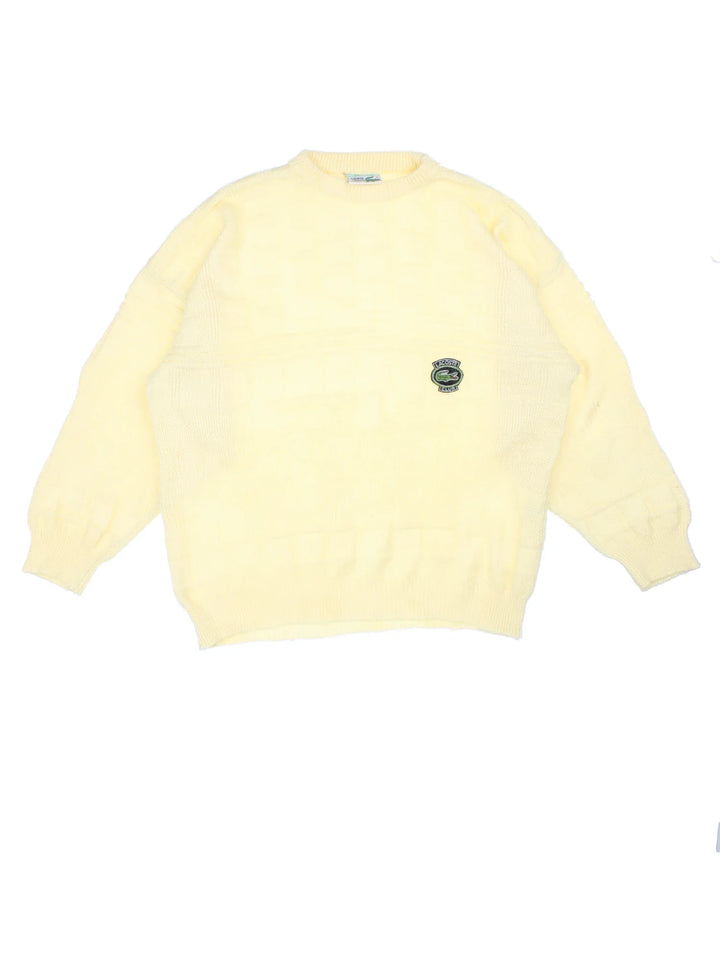 80's Lacoste Jumper in a yellow colourway with crew neck and embroidered branding on the front.