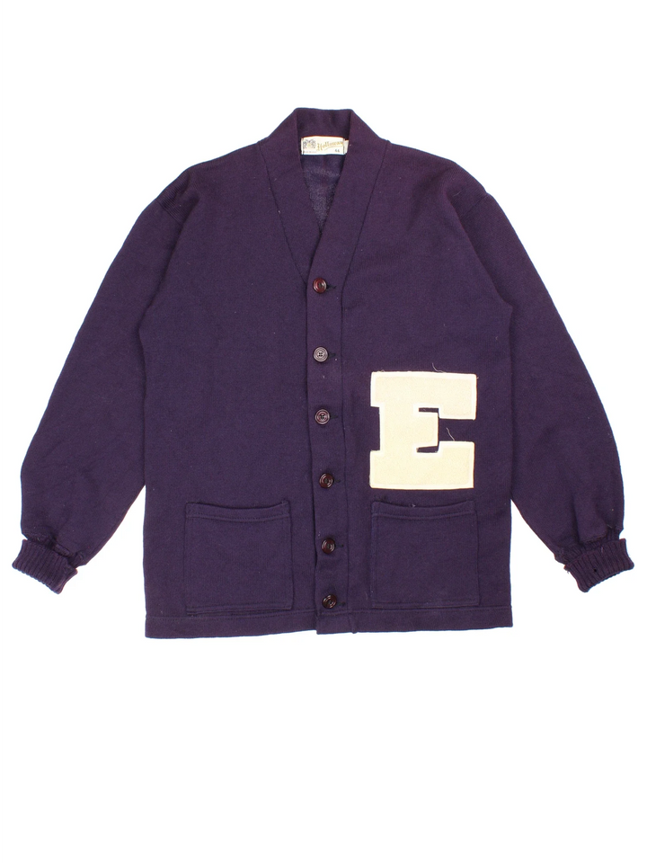 Vintage Letterman Cardigan in a purple colourway, button up closure and has embroidered lettering on the front.