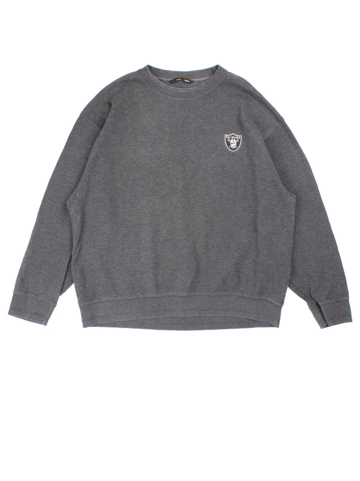 Las Vegas Raiders NFL Sweater in a grey colourway with embroidered team logo on the front.