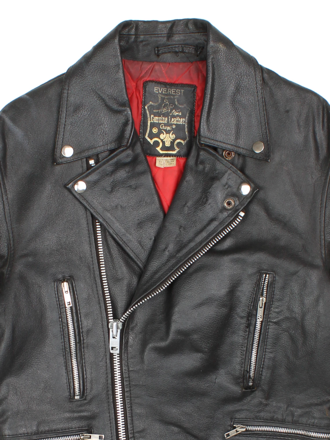 80s Campri Everest black leather biker jacket with four zip pockets and adjustable buckles on the hips.   
