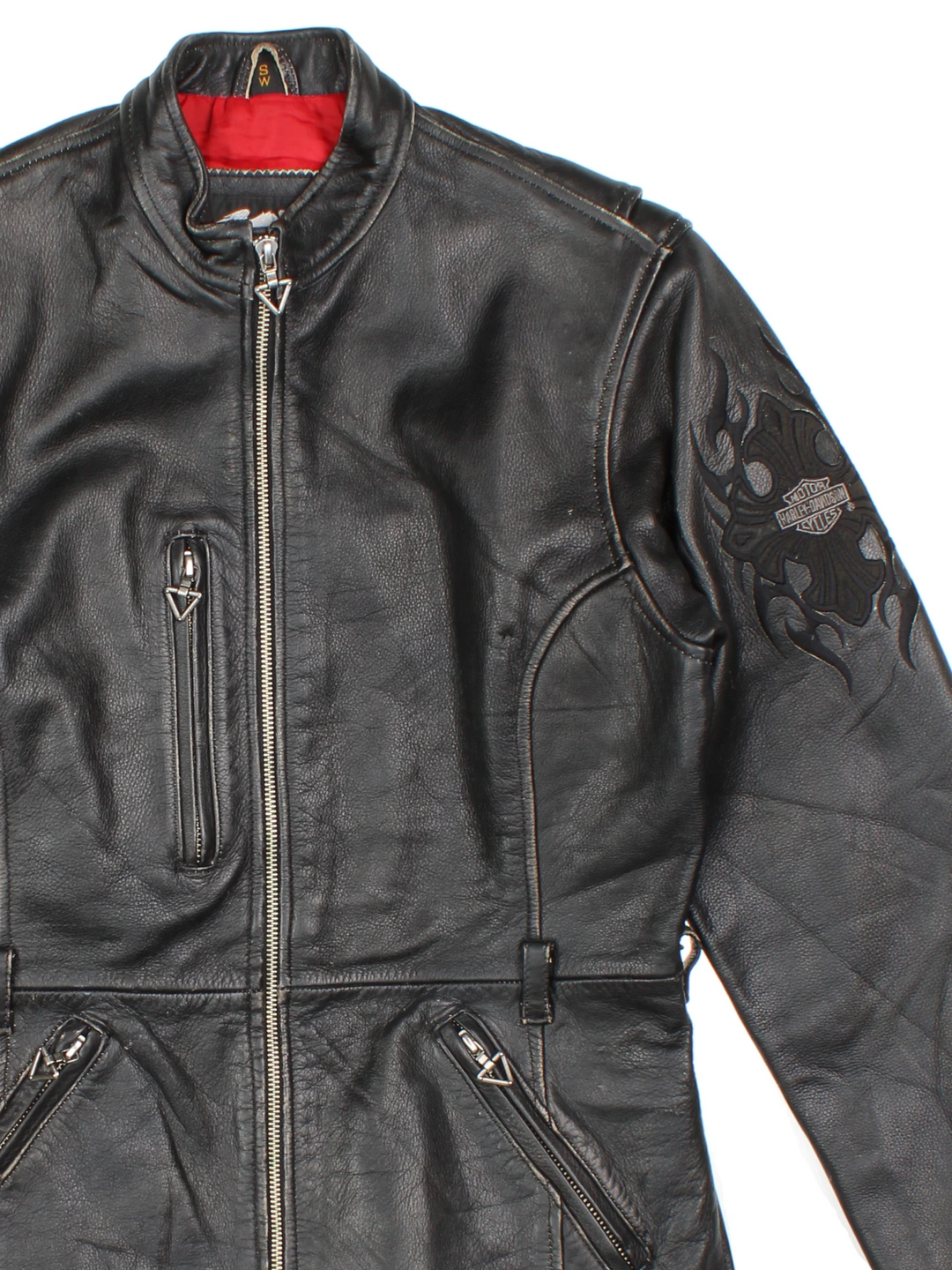Vintage Harley-Davidson leather biker jacket with embroidered logo on the sleeve.