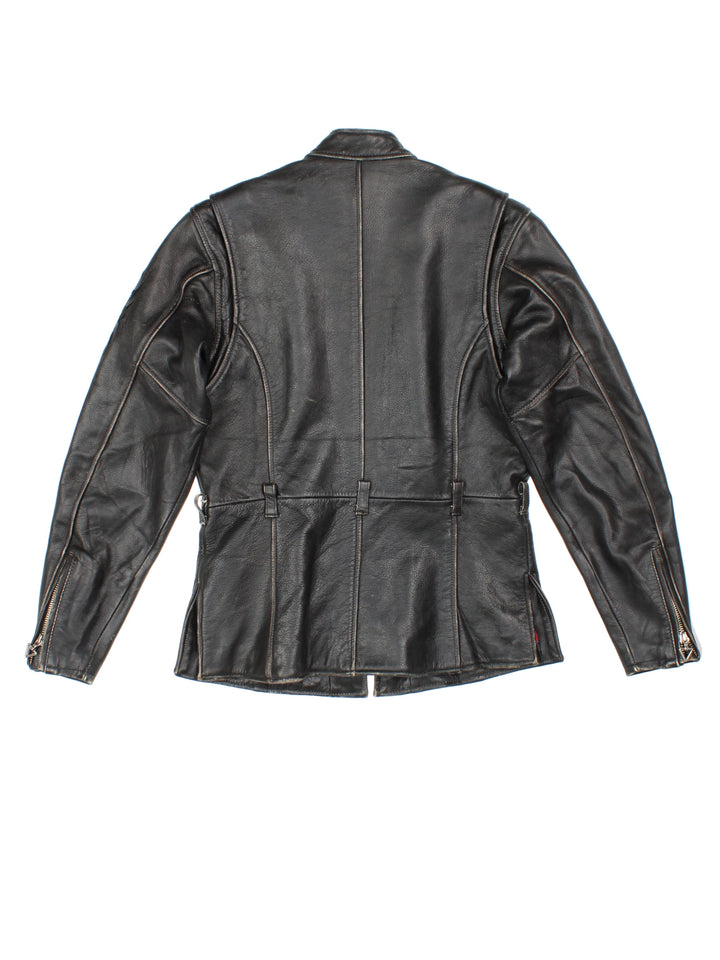 Vintage Harley-Davidson leather biker jacket with embroidered logo on the sleeve.
