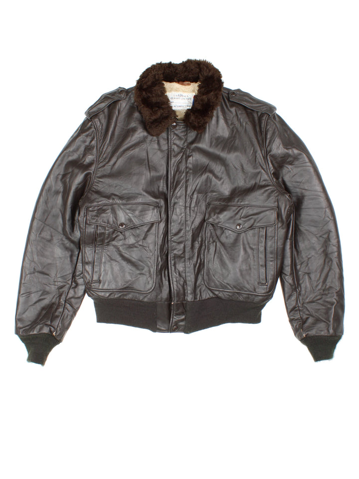 Schott Leather Flight Jacket in a brown colourway with a faux fur collar, zip up with side pockets and has a faux fur lining. 