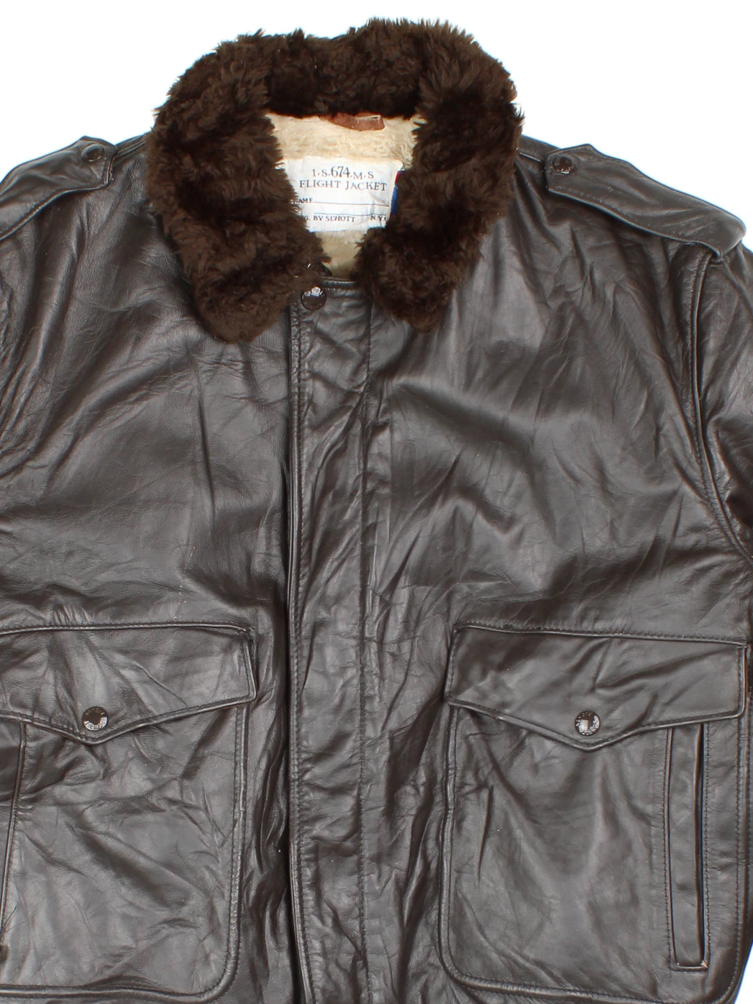 Schott Leather Flight Jacket in a brown colourway with a faux fur collar, zip up with side pockets and has a faux fur lining. 