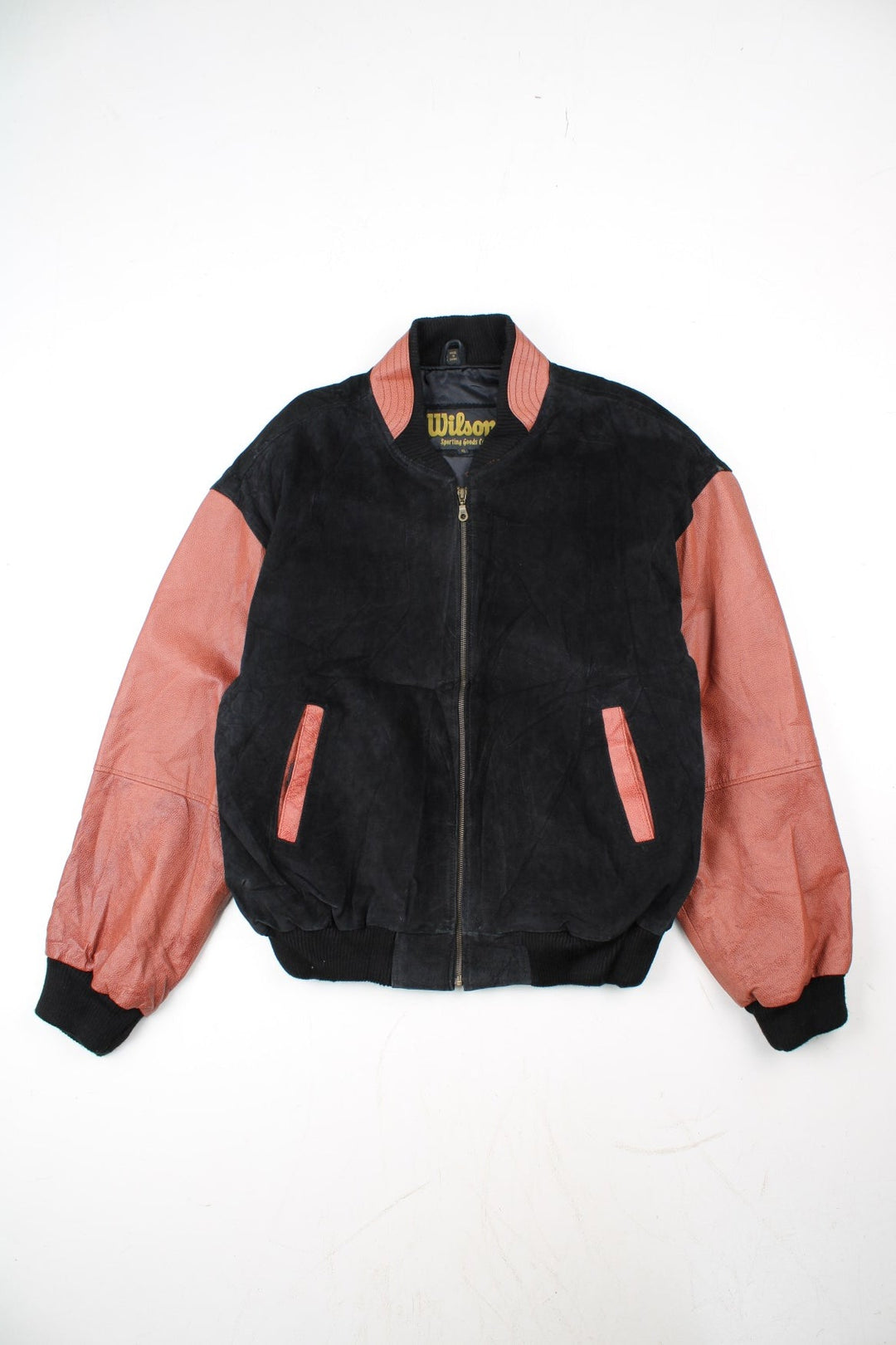 Vintage Wilson Super Bowl Bomber Jacket in a black/brown colourway. Zip up with side pockets and branded back logo. Contrast elasticated cuffs and hem.