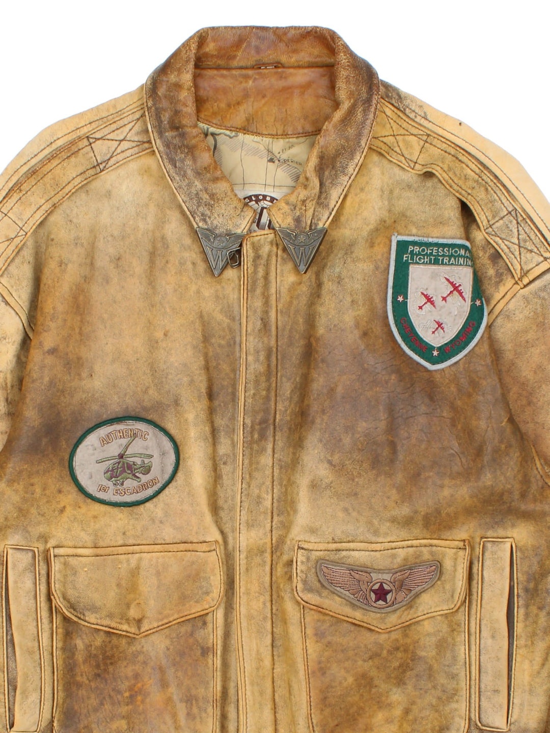 Vintage 90's Aviator Flight Leather Jacket in a brown colourway. Full zip up with double pocket on the front, Brown cuffed hem and classic aviator patches on the front and sleeves.