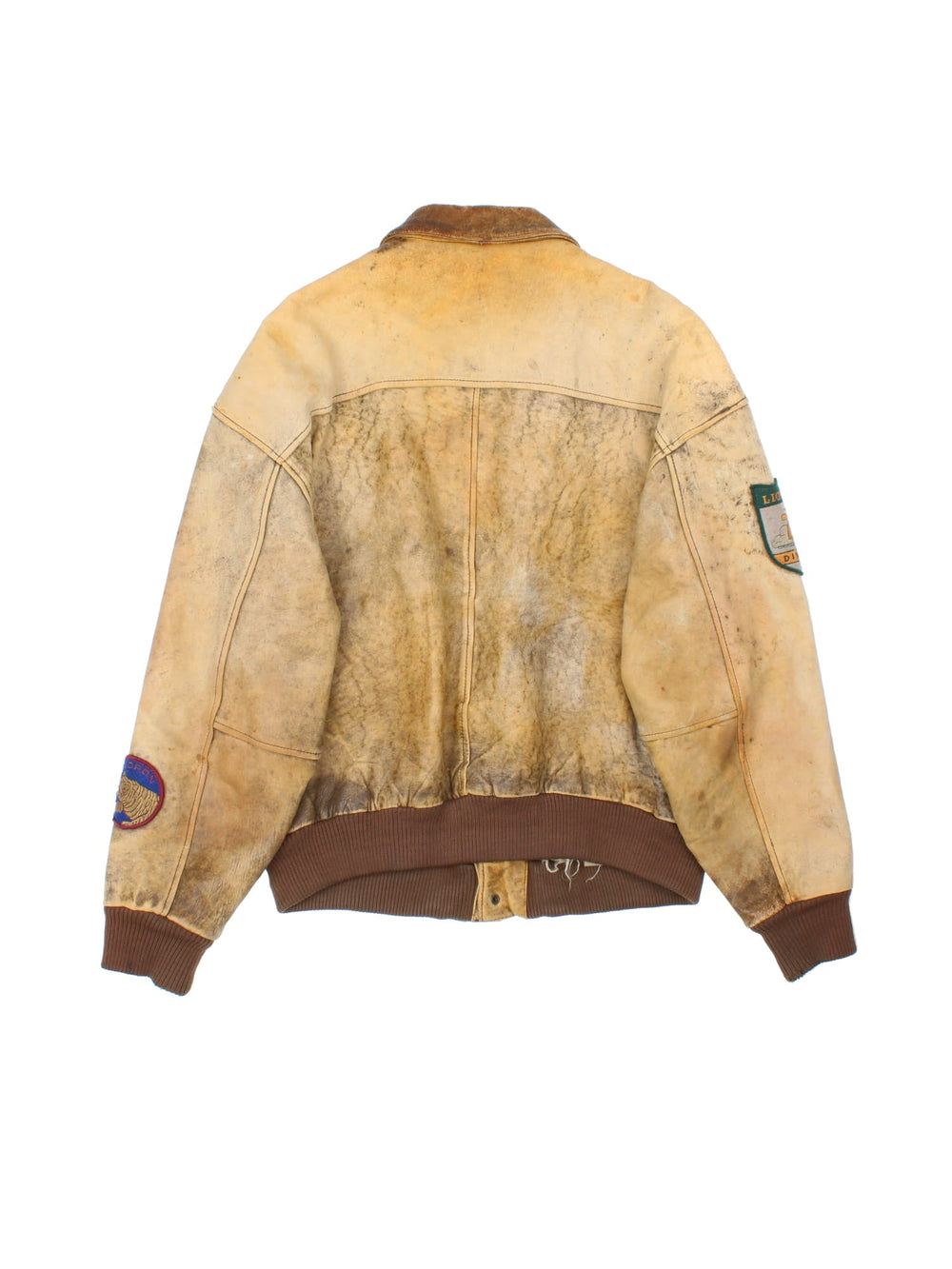 Vintage 90's Aviator Flight Leather Jacket in a brown colourway. Full zip up with double pocket on the front, Brown cuffed hem and classic aviator patches on the front and sleeves.