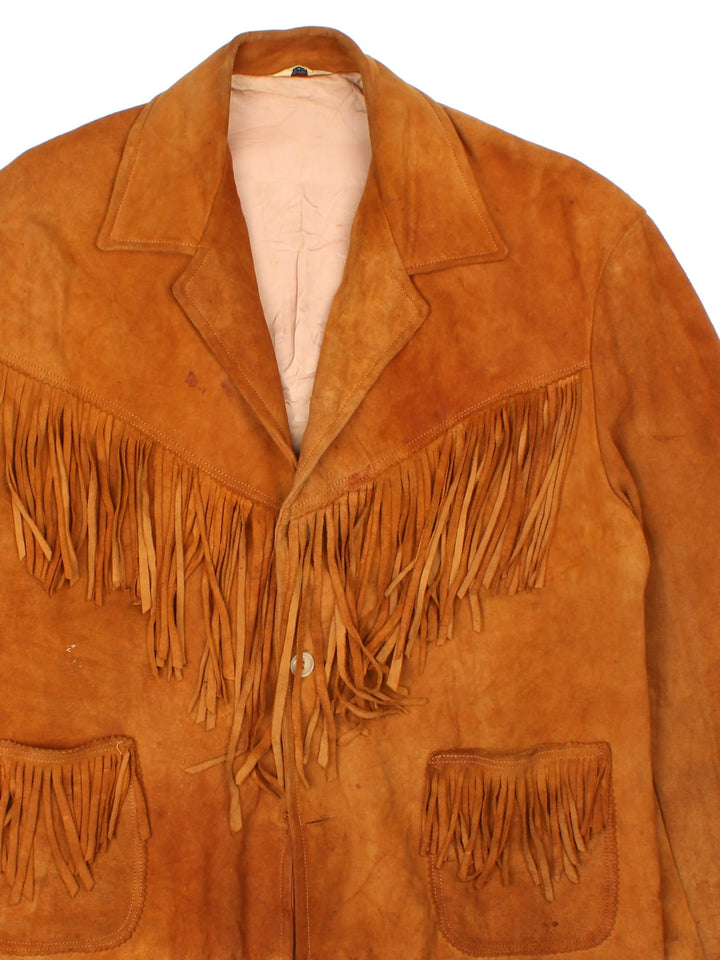 Vintage 60's Western Style Fringe Jacket in a brown colourway. Button down front with double pocket and open collar.