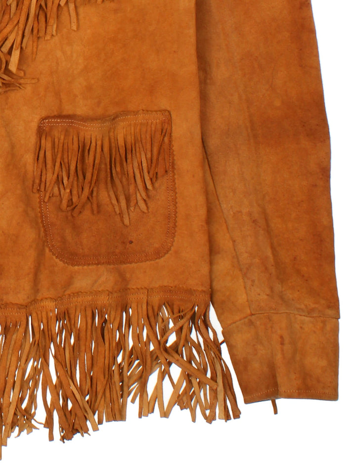 Vintage 60's Western Style Fringe Jacket in a brown colourway. Button down front with double pocket and open collar.