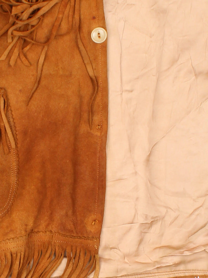 Vintage 60's Western Style Fringe Jacket in a brown colourway. Button down front with double pocket and open collar.