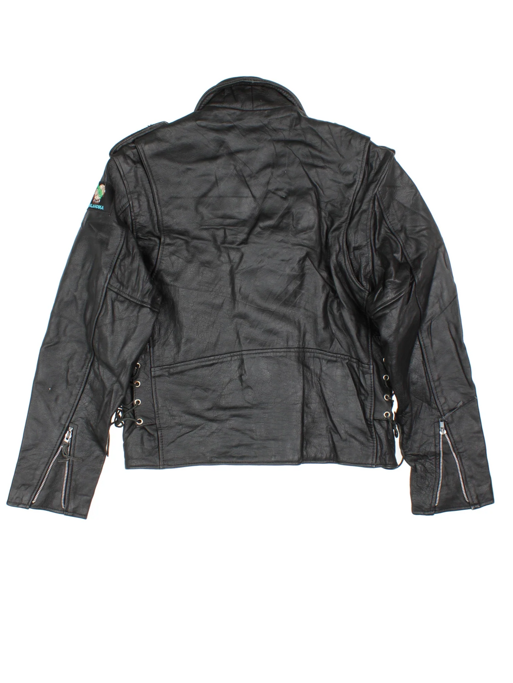Vintage Leather Biker Jacket in a black colourway. Zips up and has multiple pockets and Oklahoma badge on the left sleeve.