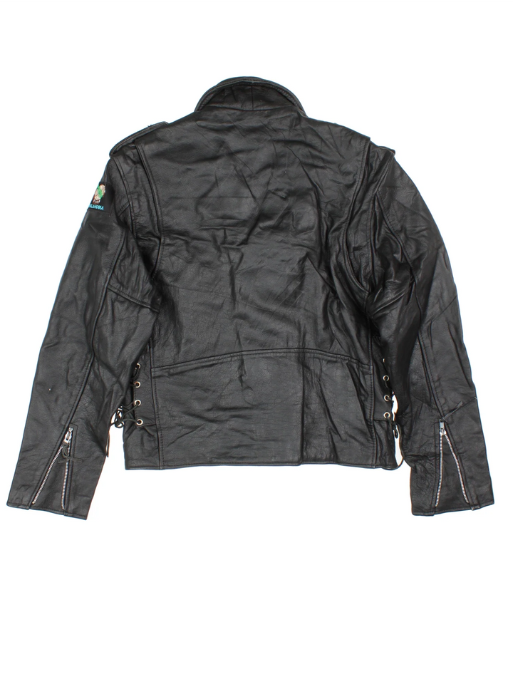 Vintage Leather Biker Jacket in a black colourway. Zips up and has multiple pockets and Oklahoma badge on the left sleeve.