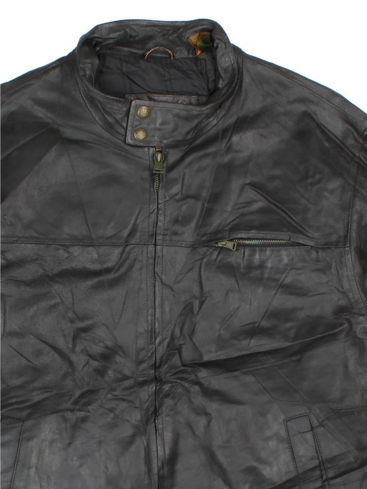 Timberland Leather Jacket in a black colourway. Zips up and has multiple pockets.