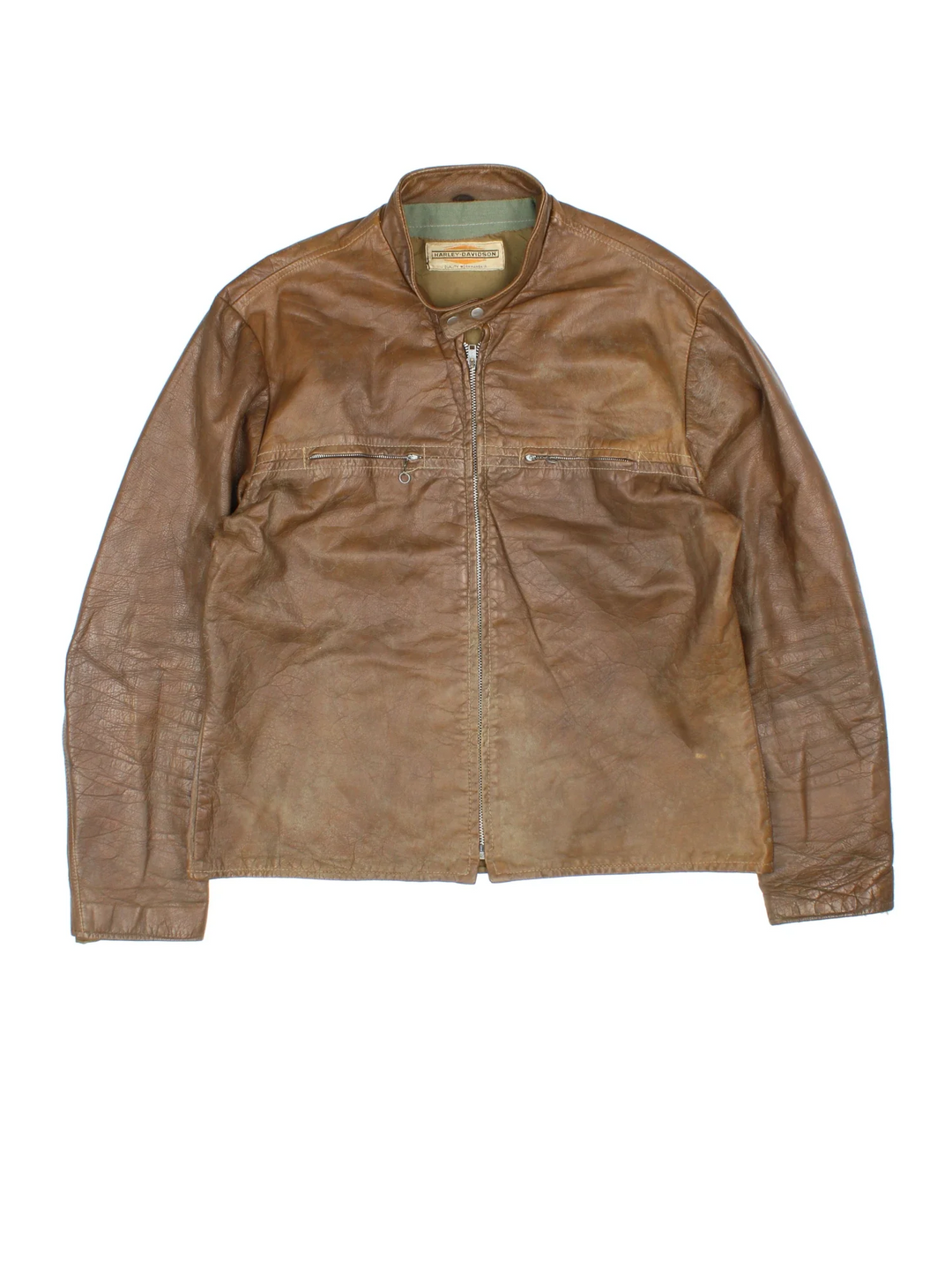 60's Harley-Davidson Leather Jacket in a brown colourway. Zips up and has double chest pockets.