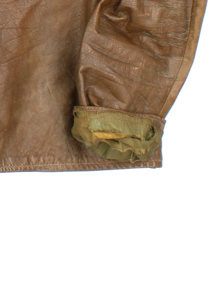60's Harley-Davidson Leather Jacket in a brown colourway. Zips up and has double chest pockets.