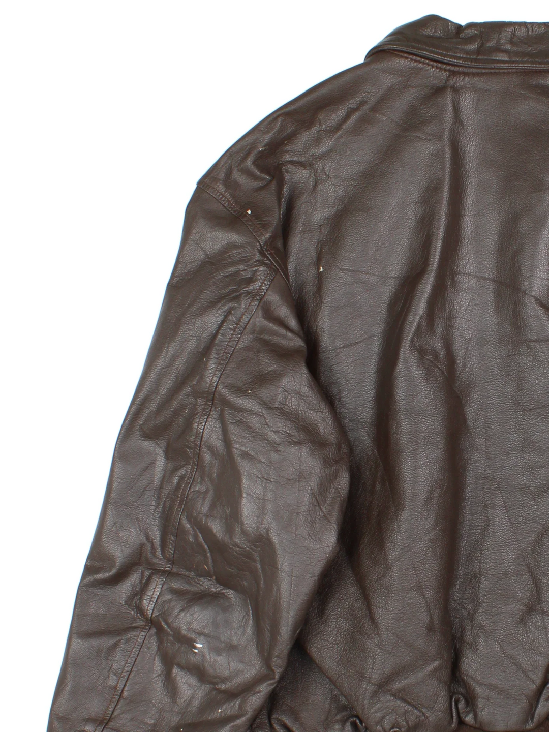 Vintage A-2 Leather Flight Jacket in a brown colourway. Zips up and has multiple pockets, and velcro patches from where badges once were.