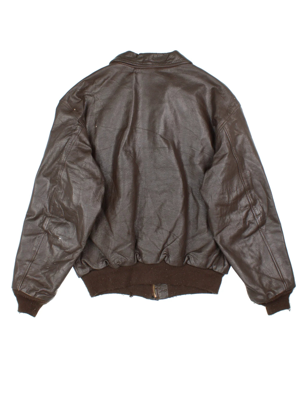 Vintage A-2 Leather Flight Jacket in a brown colourway. Zips up and has multiple pockets, and velcro patches from where badges once were.
