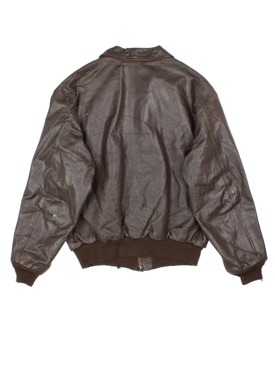 Vintage A-2 Leather Flight Jacket in a brown colourway. Zips up and has multiple pockets, and velcro patches from where badges once were.