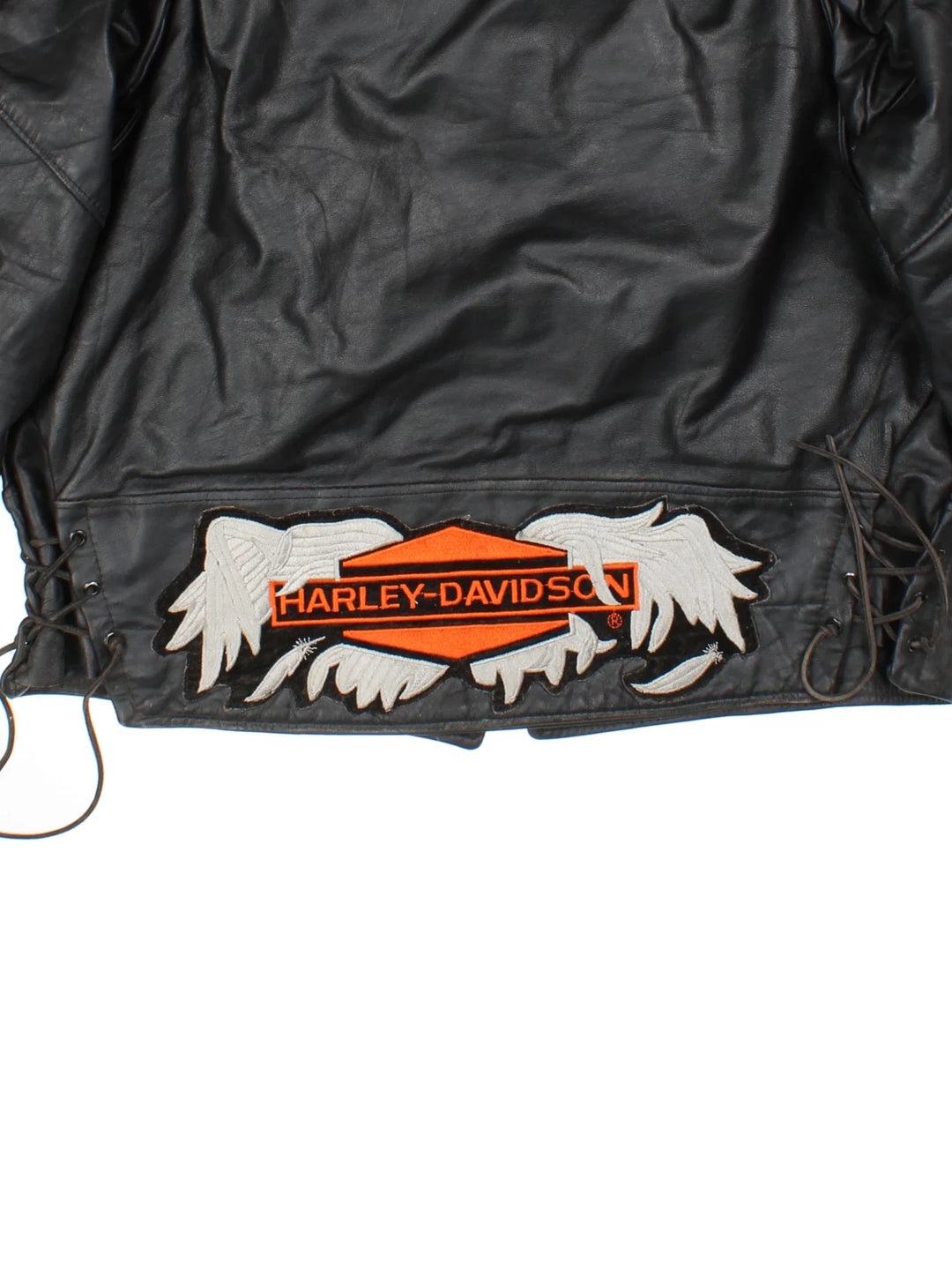 Vintage Harley-Davidson Embroidered Leather Motorcycle Jacket in a black colourway. Zips up and has multiple pockets, insulated with a quilted lining, side tie detail and branding embroidered on the back.