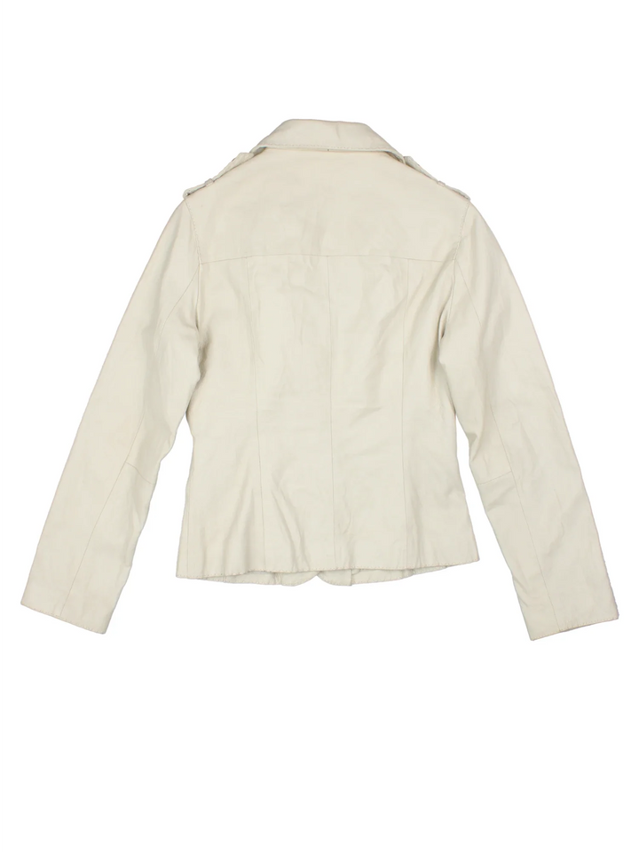Y2K Leather Blazer in a white colourway. Buttons up and has front patch pockets, insulated with lining and lapel detail.