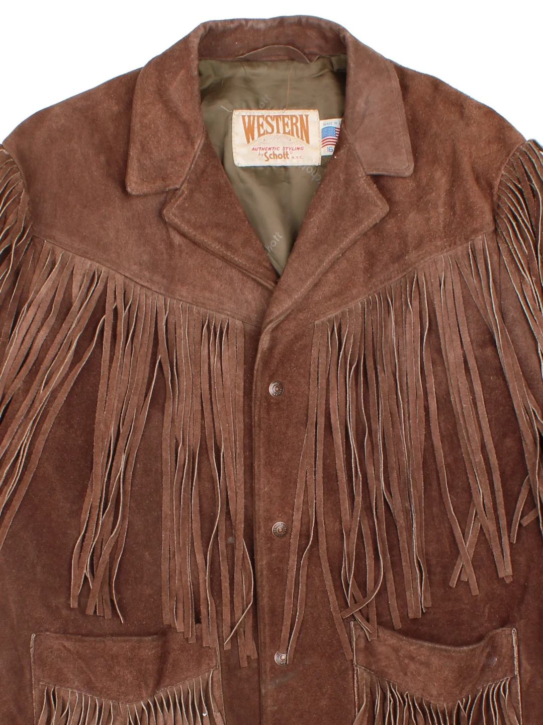 Vintage Schott Fringed Western Suede Leather Jacket in a brown colourway. Buttons up and has front patch pockets and all over fringe detail.