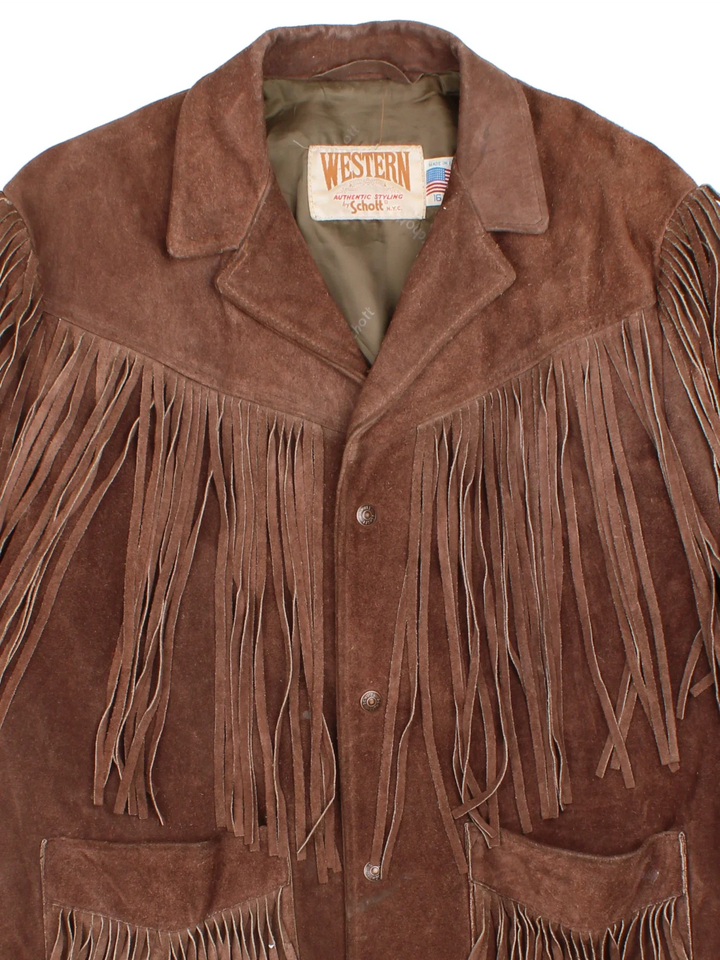 Vintage Schott Fringed Western Suede Leather Jacket in a brown colourway. Buttons up and has front patch pockets and all over fringe detail.