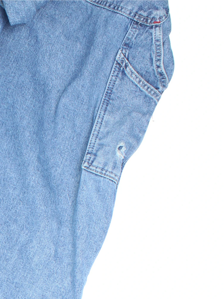Dickies Dungarees in blue colourway with multiple pockets, adjustable straps and the logo embroidered on the front.