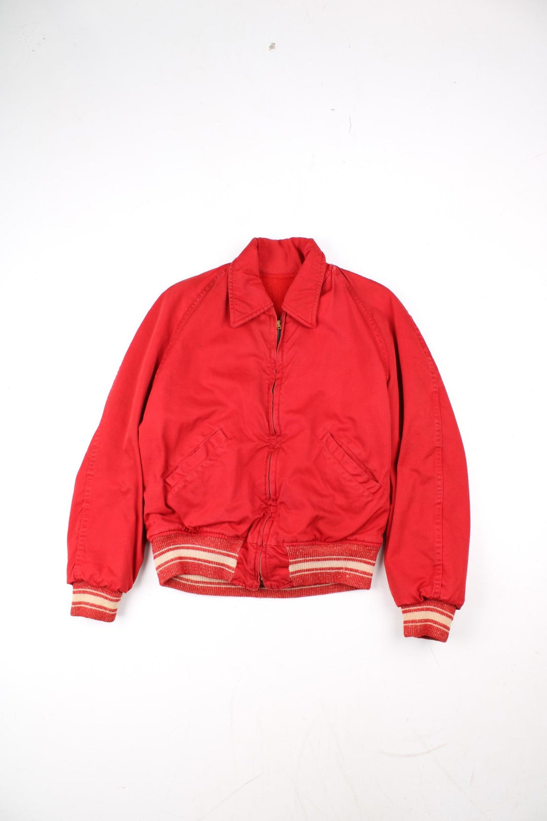 Vintage 70's Reversible Varsity Jacket in a red colourway with either canvas or woolen reversible options. Zips up and has side pockets, and has 'American Turner Social' logo embroidered on the front and back.