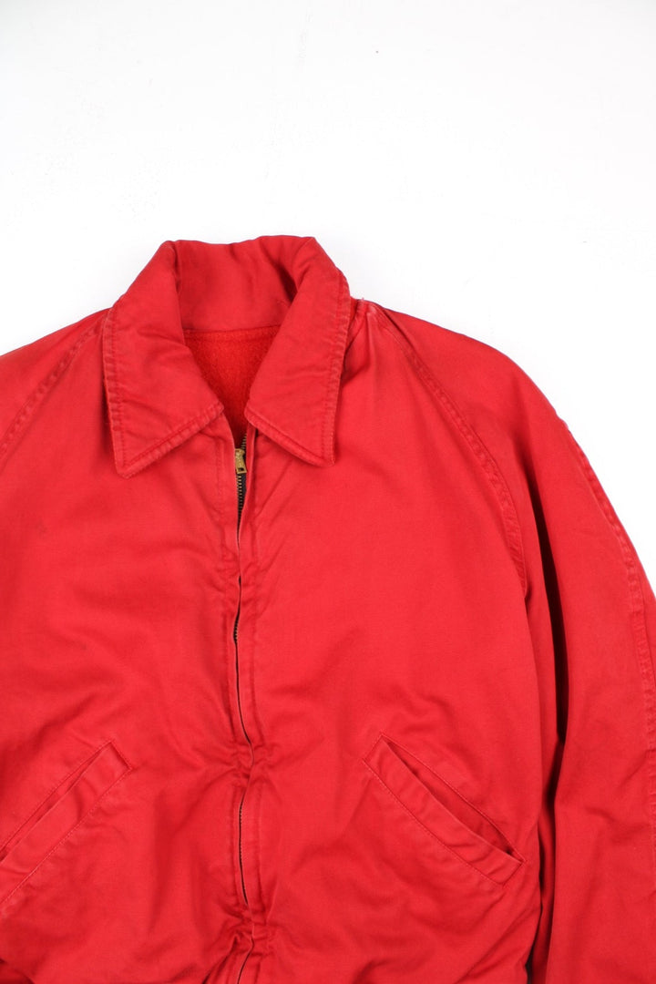 Vintage 70's Reversible Varsity Jacket in a red colourway with either canvas or woolen reversible options. Zips up and has side pockets, and has 'American Turner Social' logo embroidered on the front and back.