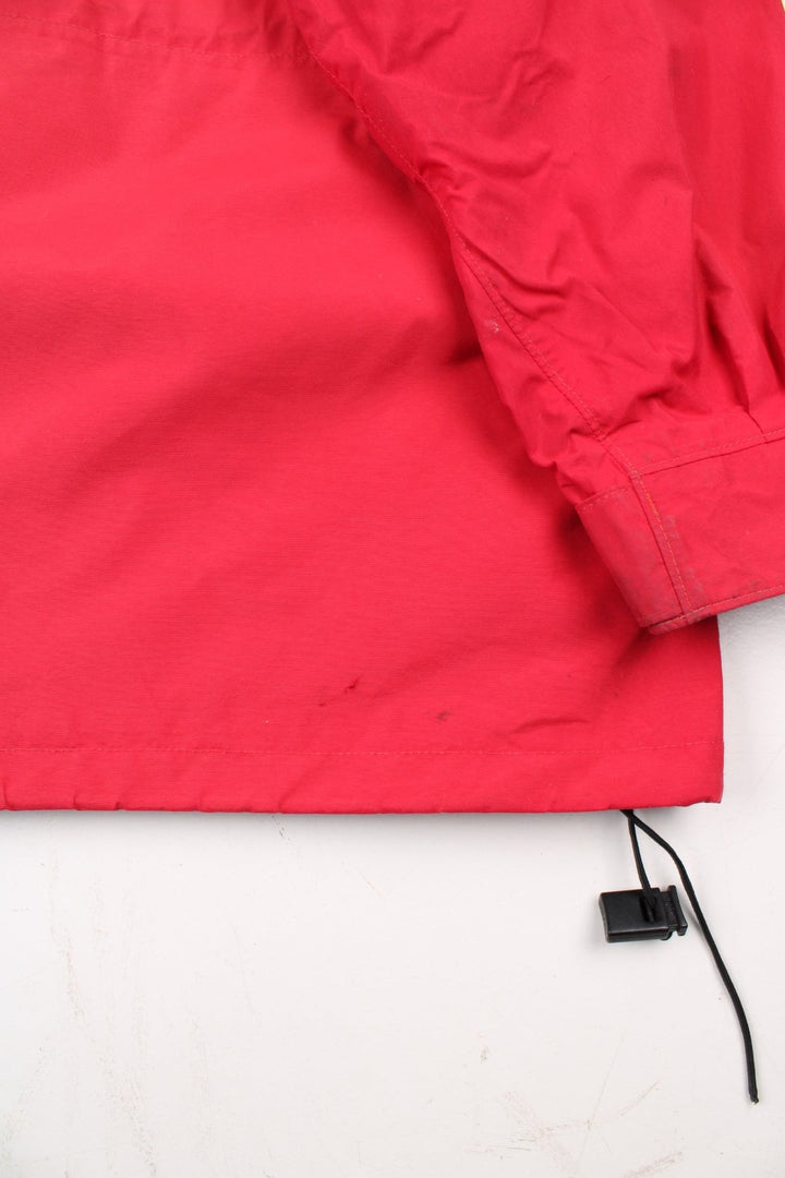 Vintage Mountain Equipment Jacket in a red colourway. Zips up and has side pockets, hooded, and has the logo embroidered on the front by the hem.