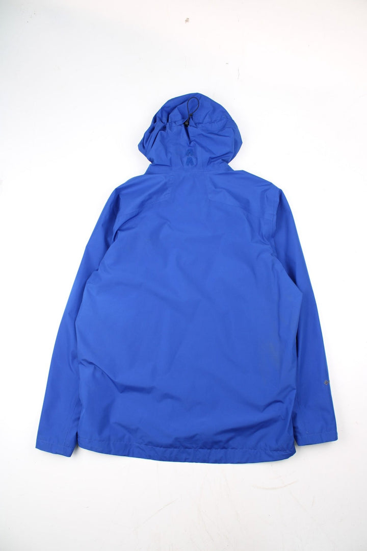 Sprayway Gore-Tex Jacket in a blue colourway. Zips up and has side pockets, hooded, and has the logo embroidered on the front.