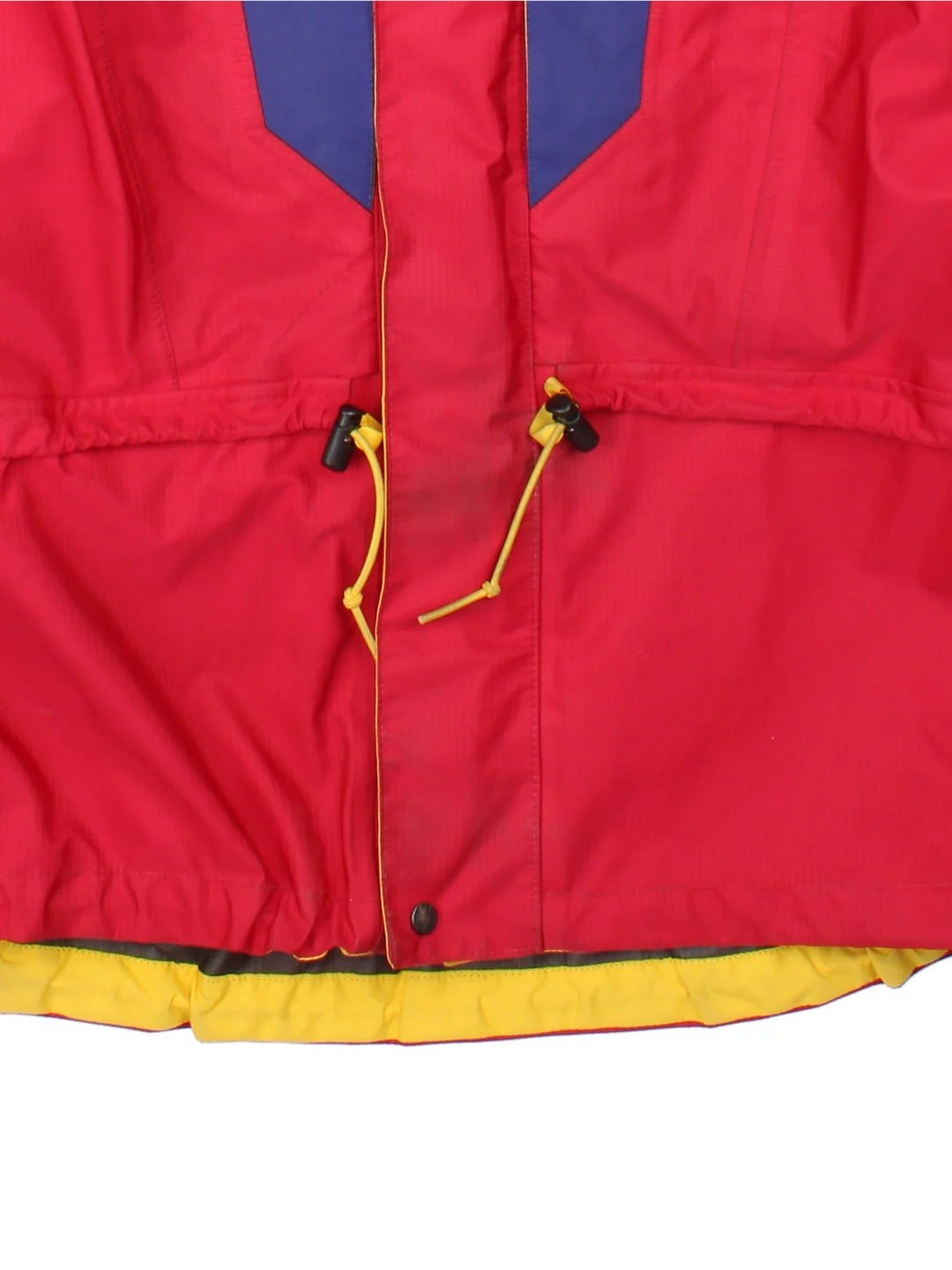 Vintage 90's Berghaus Manaslu Gore-Tex Coat in a red/blue colourway, zips up and has multiple pockets, hooded, insulated with a Gore-tex lining, and has the logo embroidered on the front.