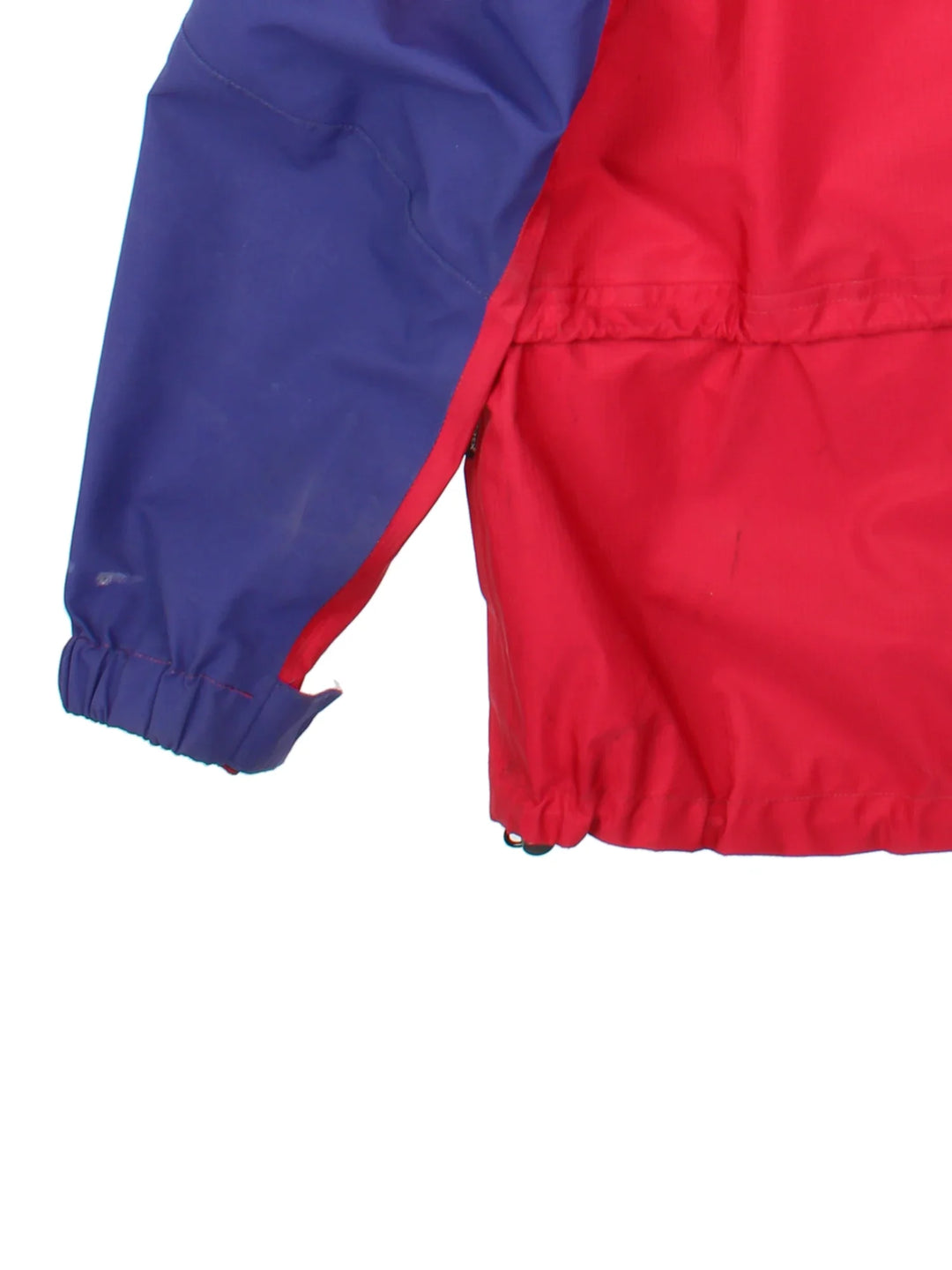 Vintage 90's Berghaus Manaslu Gore-Tex Coat in a red/blue colourway, zips up and has multiple pockets, hooded, insulated with a Gore-tex lining, and has the logo embroidered on the front.