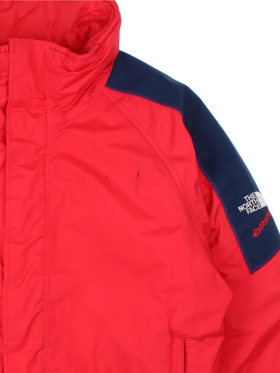 Vintage 90's The North Face Extreme Jacket in a red/blue colourway, zips up and has multiple pockets, insulated with a padded lining, and has the logo embroidered on the sleeve.