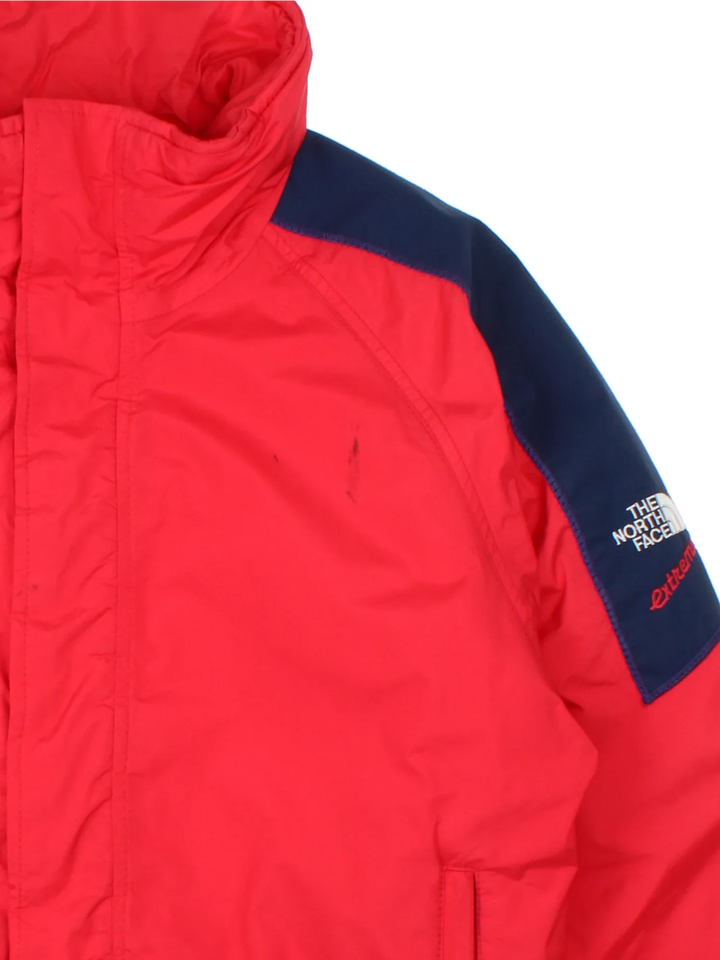 Vintage 90's The North Face Extreme Jacket in a red/blue colourway, zips up and has multiple pockets, insulated with a padded lining, and has the logo embroidered on the sleeve.