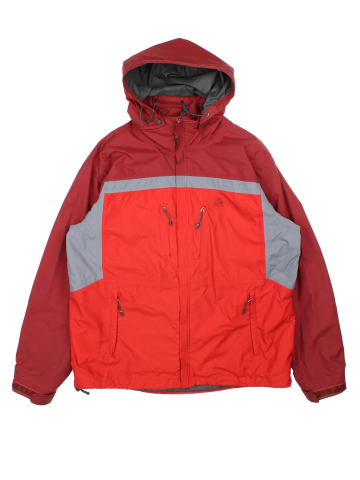 Nike ACG Coat in a red colourway with contrasting red and grey panelling. full zip up, hood and has multiple pockets, classic logo embroidered on the front.